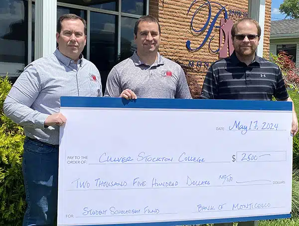 Bank of Monticello representatives presented a $2500 gift to Culver-Stockton College President Dr. Lauren Schellenberger.