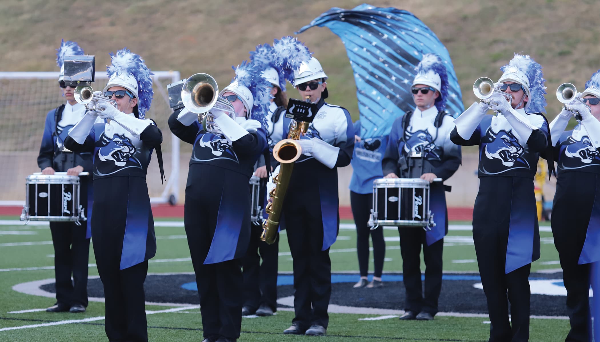 Photo of the Culver-Stockton College Marching Band playing at a home football game in 2024.