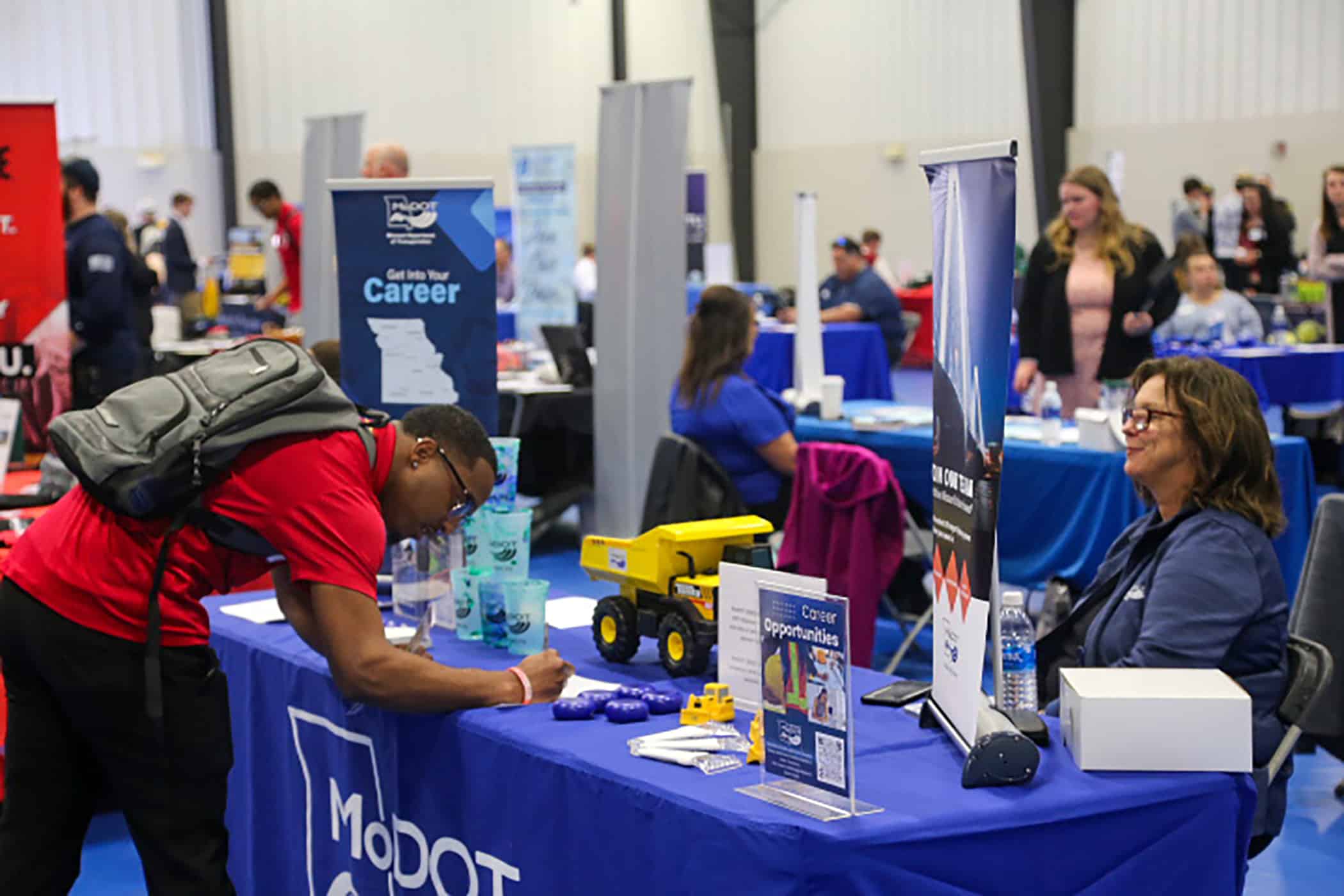 Photo of student filling out information at the Culver-Stockton College 2025 Tri-State Career Fair