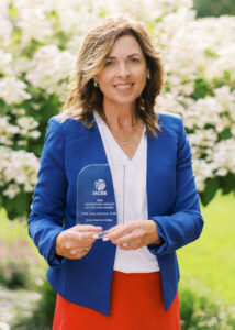 Culver-Stockton College's Dr. Dell Ann Janney pictured with her IACBE Accounting Faculty of the Year award.